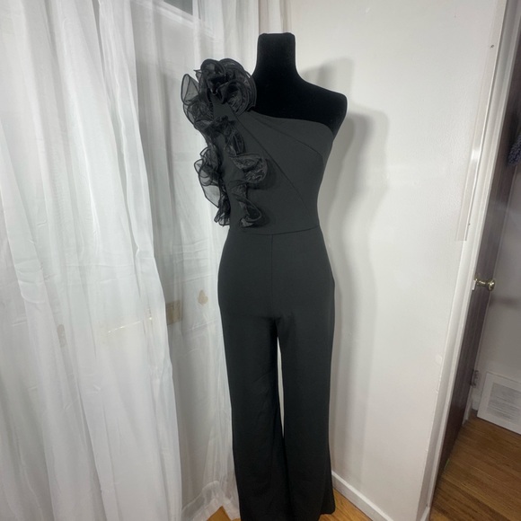 Chic Black One-Shoulder Jumpsuit with Ruffle Detail - Picture 2 of 7